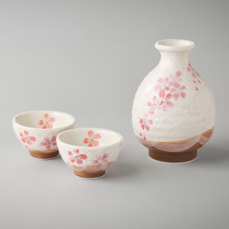 Japanese ceramic sake service, 1 bottle and 2 cups, SAKURAZAKE, white and pink flowers