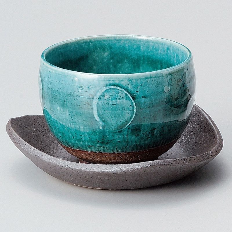 Japanese cup in blue clay and circle patterns with saucer